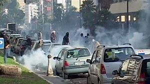 Violence erupts in Naples over German official visit