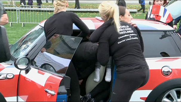 28 women into a Mini Cooper
