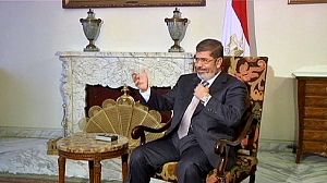 Egyptian opposition calls for a day of protests following Mursi decree