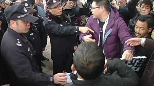 China’s strike-hit paper to publish as normal