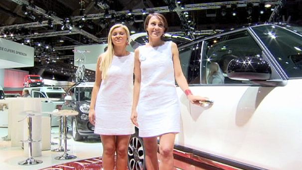Belgian minister urges car show models to cover up