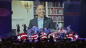 Obama rolls up sleeves to promote volunteering