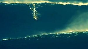 Surfer stakes a new claim for taming the biggest wave