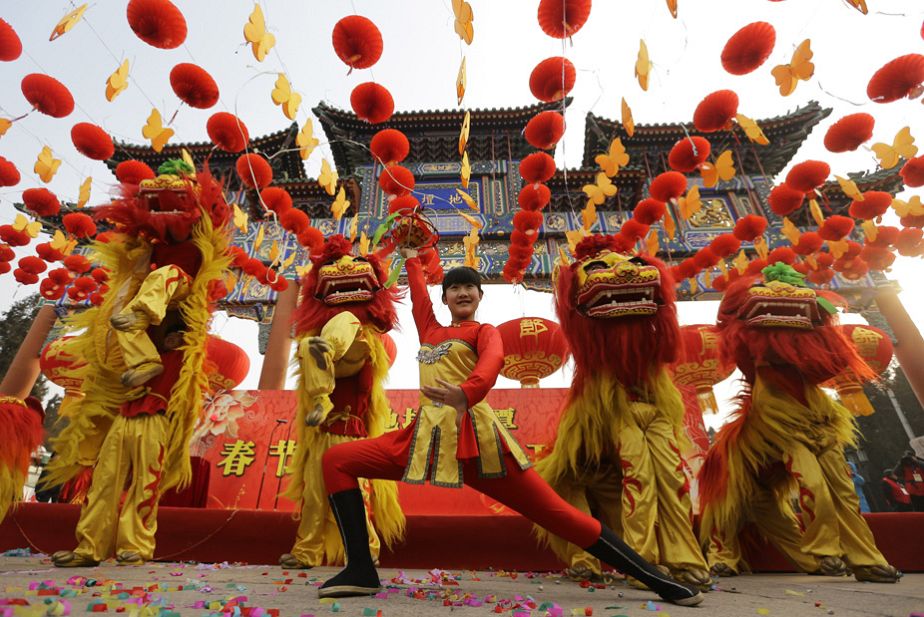 The lion dance to celebrate the Year of the Snake The lion dance to celebrate the Year of the Snake