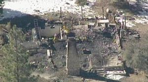 L.A. police deny burning down cabin in hunt for fugitive