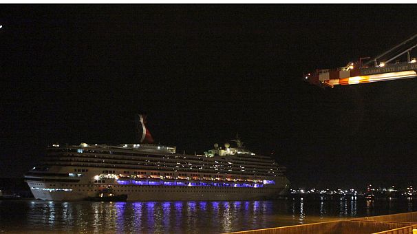 Stricken cruise ship makes landfall