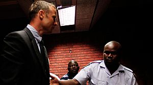 Pistorius cries in court as murder charges read out
