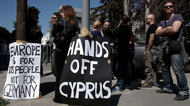Cypriot ministers delay vote, try to revise bank tax plan