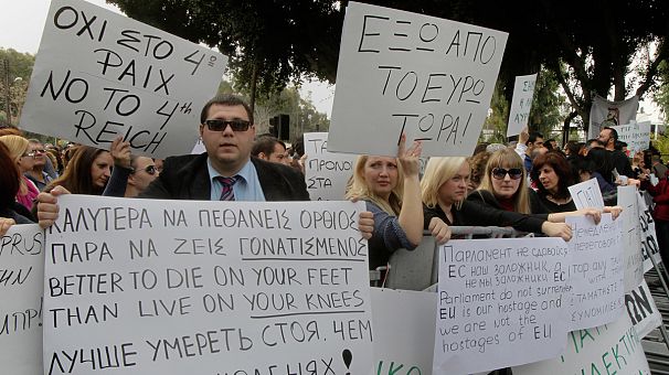 Cypriots anxiously await government decision