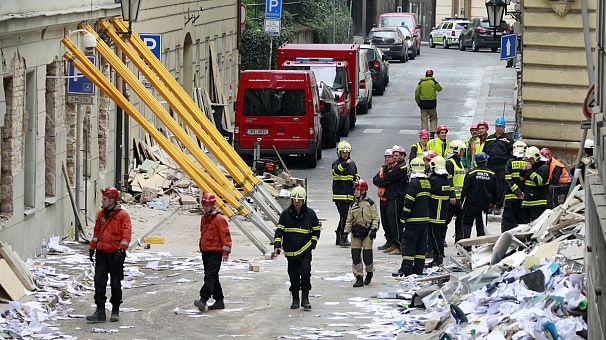 Rescuers search for workers buried in Prague office explosion