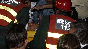 Pakistan's Imran Khan injured by fall at rally