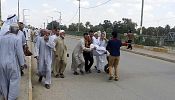 At least 80 die in Iraqi bombings