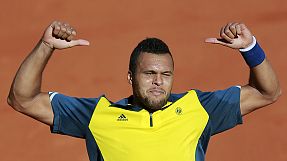 sport: Tsonga beats Federer in quarters