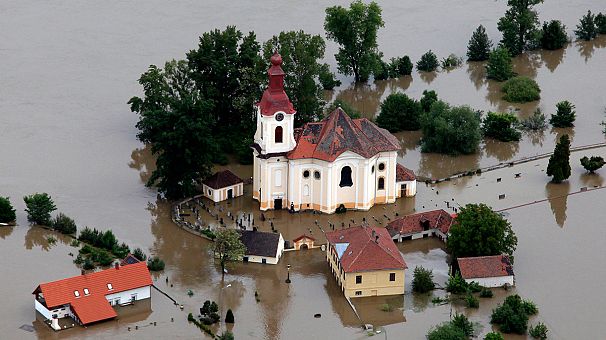Prague residents assess flood damage as water recedes