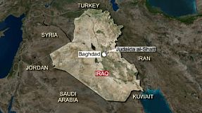 Iraq market attack kills at least 13