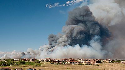 Colorado fires force thousands to flee Colorado fires force thousands to flee