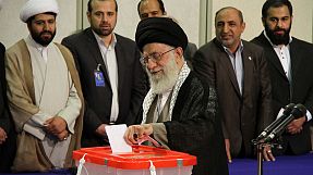 Khamenei leads Iranian voters to polls