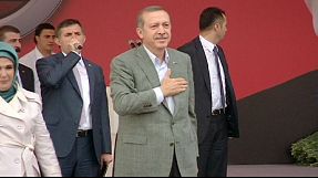 Turkish prime minister defiant at rally