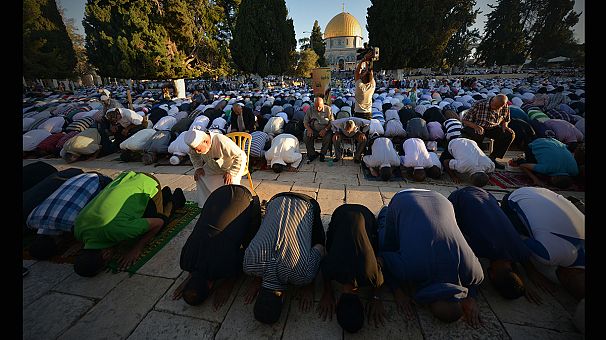 Muslims break fast after Ramadan as Eid al-Fitr festival gets underway