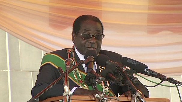 Zimbabwe’s Mugabe tells election critics to ‘go hang’