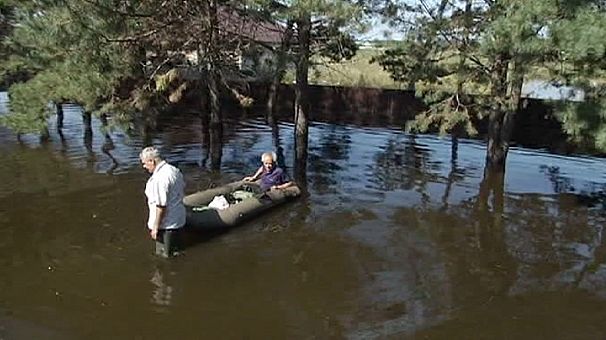 Thousands flee homes after floods hit eastern Russia
