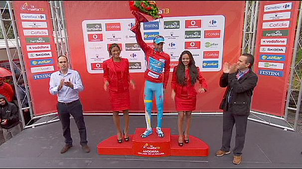 Ratto defies bad weather to win stage 14