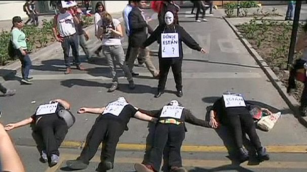Thousands march for rights in Chile 40 years on from coup