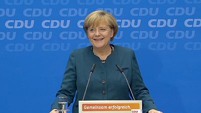 Triumphant Merkel seeks coalition talks with rivals SPD in Germany Triumphant Merkel seeks coalition talks with rivals SPD in Germany