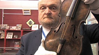 Titanic violin fetches record million euros at auction Titanic violin fetches record million euros at auction