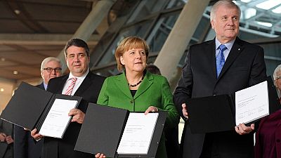 Germany gets new right-left coalition government Germany gets new right-left coalition government