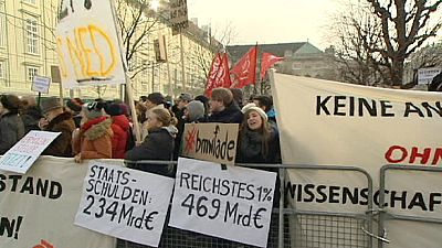 Demonstrations greet new Austrian coalition as 27-year-old foreign minister is sworn in Demonstrations greet new Austrian coalition as 27-year-old foreign minister is sworn in