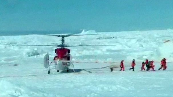 Helicopter rescues passengers on stranded Antarctic ship