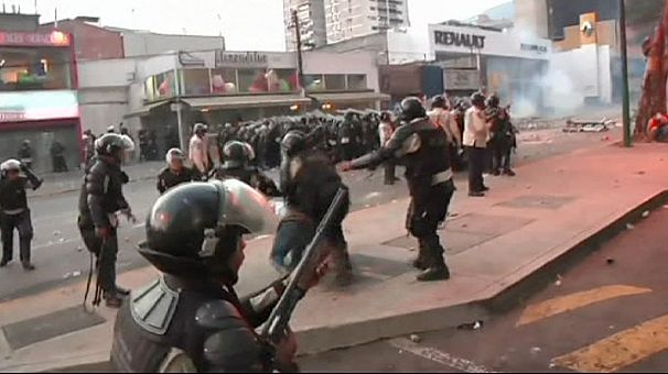 Tensions rise in Venezuela as pro and anti-government activists take to streets of Caracas