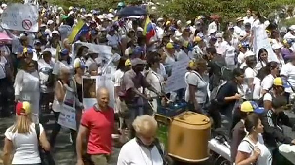 Venezuela’s president calls for national peace conference as protests continue