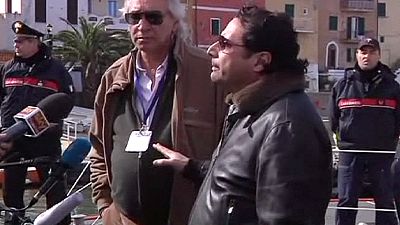 Costa Concordia captain boards wreck with accident investigators Costa Concordia captain boards wreck with accident investigators