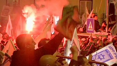Scuffles in Portugal as police protest over wage cuts Scuffles in Portugal as police protest over wage cuts
