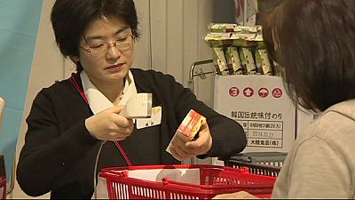 Japan raises sales tax for first time in 17 years to cut debt Japan raises sales tax for first time in 17 years to cut debt