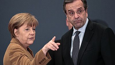 Handshakes and protests, Merkel’s Greek visit Handshakes and protests, Merkel’s Greek visit