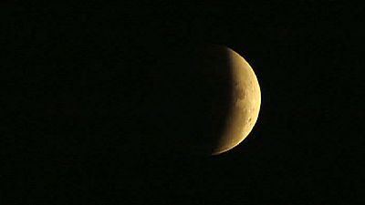 Millions in Americas and Australasia gaze at full lunar eclipse Millions in Americas and Australasia gaze at full lunar eclipse
