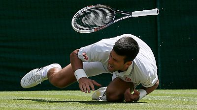 Novak Djokovic injured in Wimbledon Novak Djokovic injured in Wimbledon