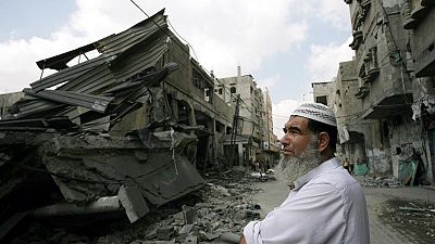 Gaza city: civilians seeking refuge killed by air strike Gaza city: civilians seeking refuge killed by air strike