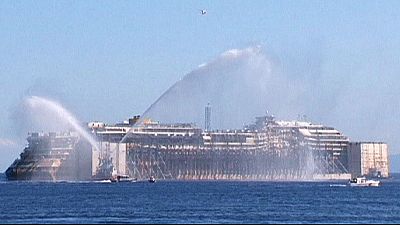 Costa Concordia finally clear of Giglio, destined for dismemberment Costa Concordia finally clear of Giglio, destined for dismemberment