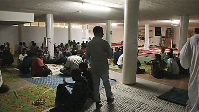 Migrants and refugees celebrate Muslim holiday in an abandoned building in Rome Migrants and refugees celebrate Muslim holiday in an abandoned building in Rome