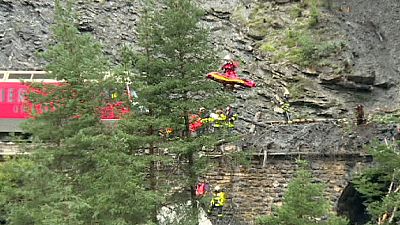 Heavy rain blamed after Swiss train derails Heavy rain blamed after Swiss train derails
