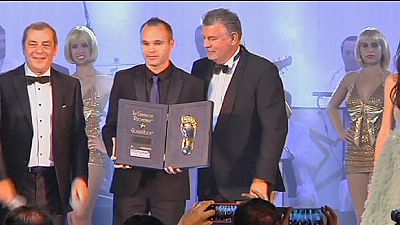 Andres Iniesta gets the Golden Foot award ahead of Cristiano Ronaldo Andres Iniesta gets the Golden Foot award ahead of Cristiano Ronaldo