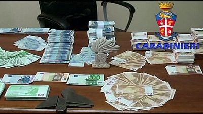 Dozens arrested in Italy counterfeit cash crackdown Dozens arrested in Italy counterfeit cash crackdown