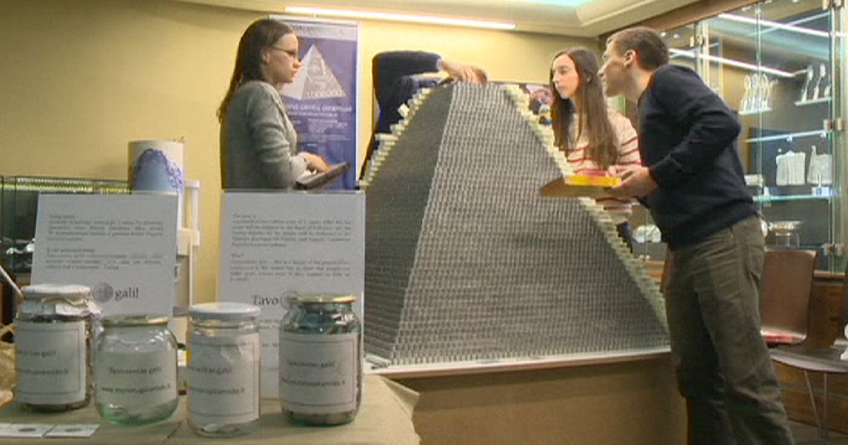 Lithuania builds 'world's largest coin pyramid' to celebrate move to ... - euronews
