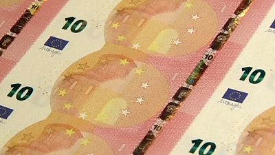 Euro sinks to a nine-year low against the dollar Euro sinks to a nine-year low against the dollar