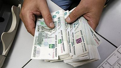 Russian stocks, bonds and rouble all slide on weak oil and Ukraine fighting Russian stocks, bonds and rouble all slide on weak oil and Ukraine fighting