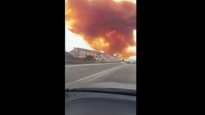 Toxic orange cloud forces locals indoors after chemical explosion in Spain Toxic orange cloud forces locals indoors after chemical explosion in Spain